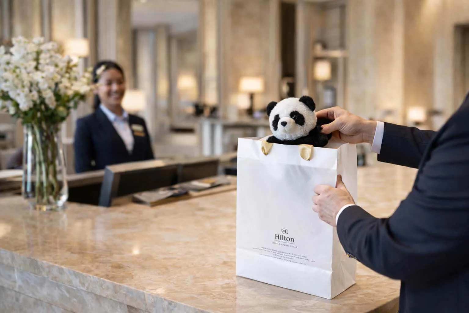 White Translucent Plastic Gift Bags for Hotel and Corporate Packaging Solutions 4 White Translucent Plastic Gift Bags for Luxury Hotel Reception Packaging Scene